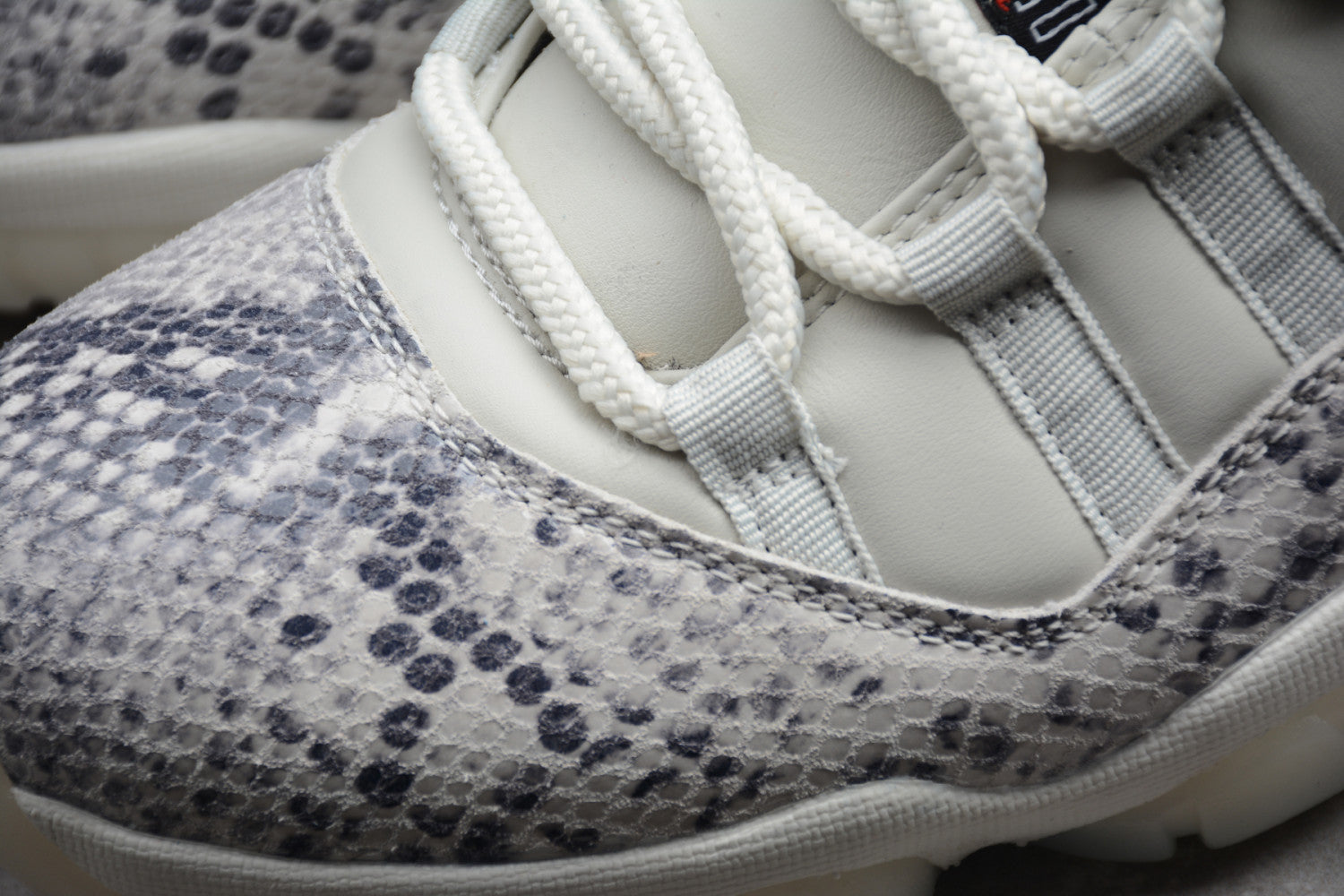 Air Jordan 11 Low Snakeskin “Light Bone” CD6846-002
