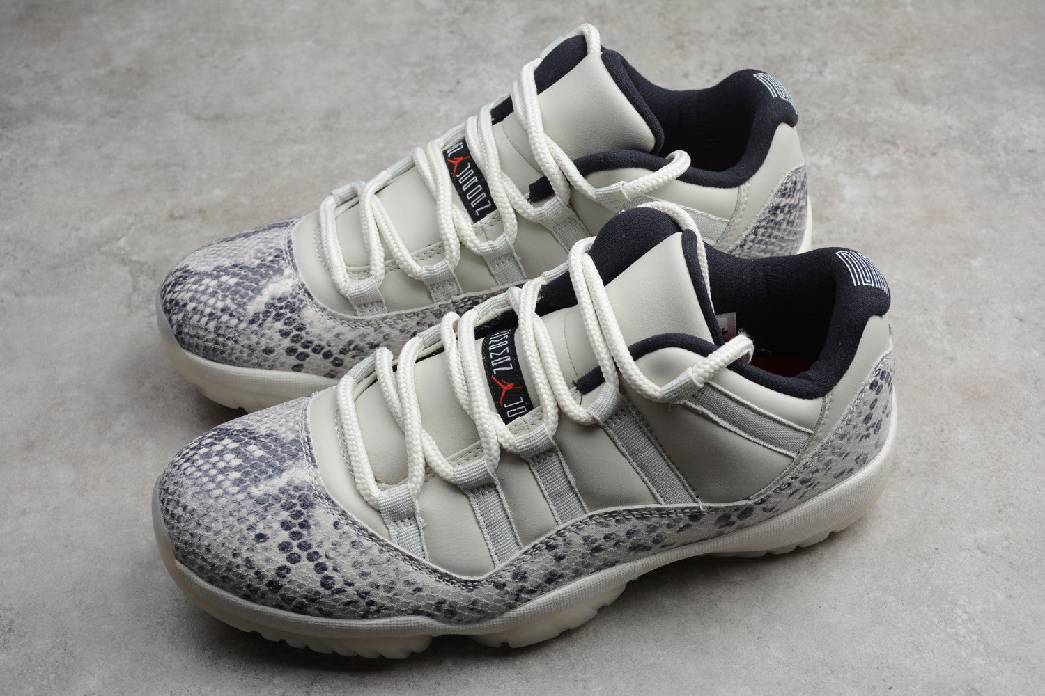 Air Jordan 11 Low Snakeskin “Light Bone” CD6846-002